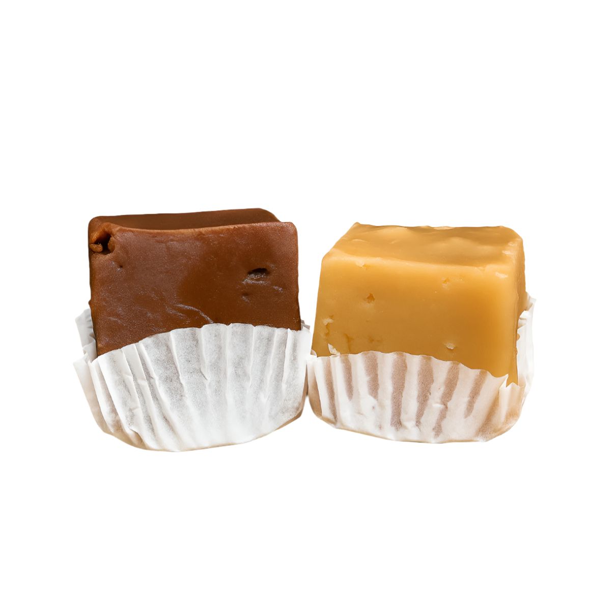 Enjoy two square pieces of Fudge—one chocolate, one caramel—in white paper candy cups. This delightful sweet treat is isolated on a white background.